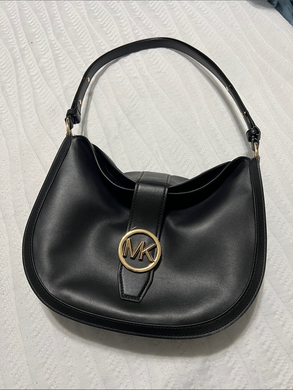 Michael Kors Black Leather Bag with Gold MK Emblem and Adjustable Strap